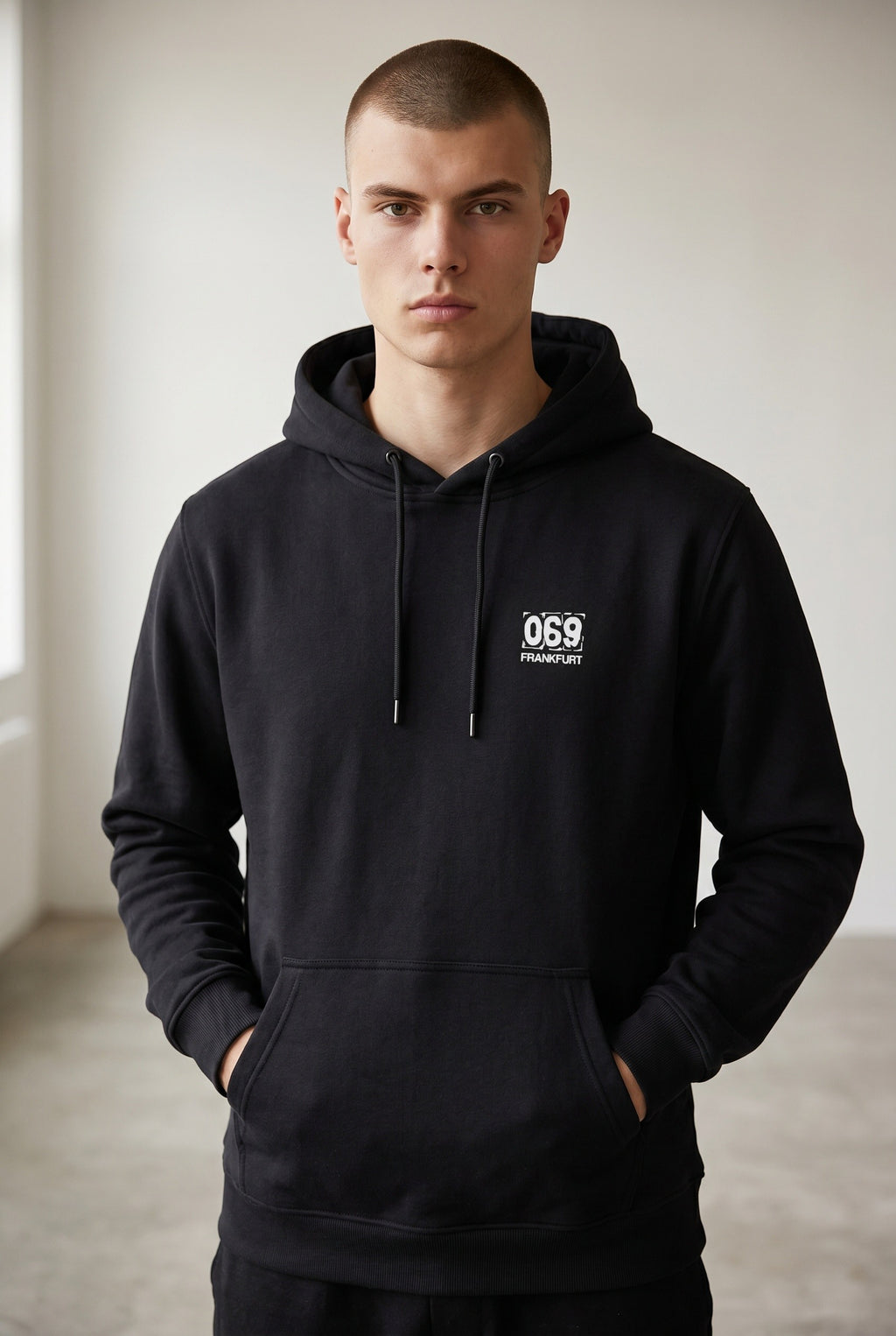 „069“ MINI PRINT HOODIE – DEEP BLACK