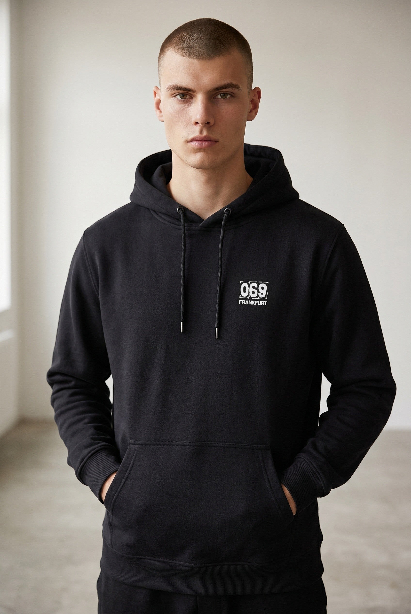 „069“ MINI PRINT HOODIE – DEEP BLACK